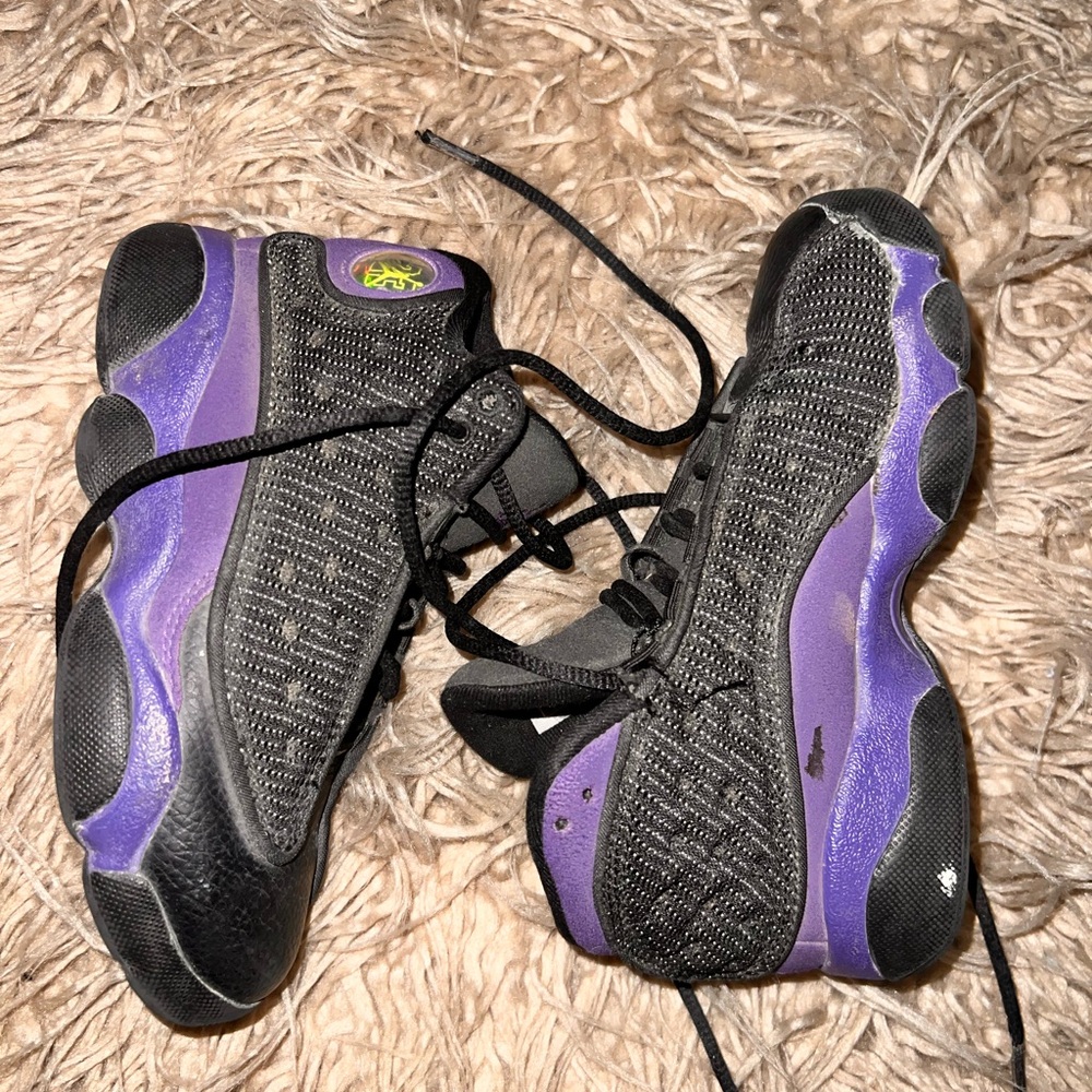 Black and Purple Jordan 13s